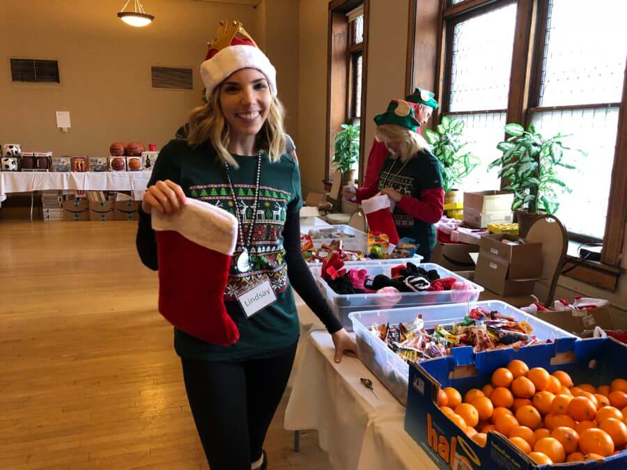 Lady holding a Christmas stocking