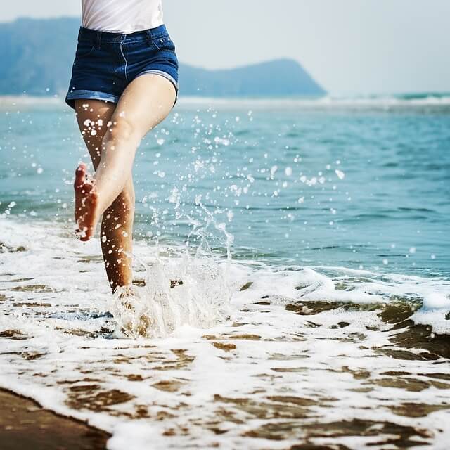 walking barefoot on the beach