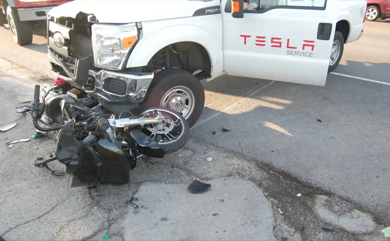Tesla truck crashing into a motorcycle