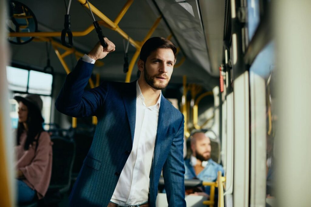 a man commuting in the bus