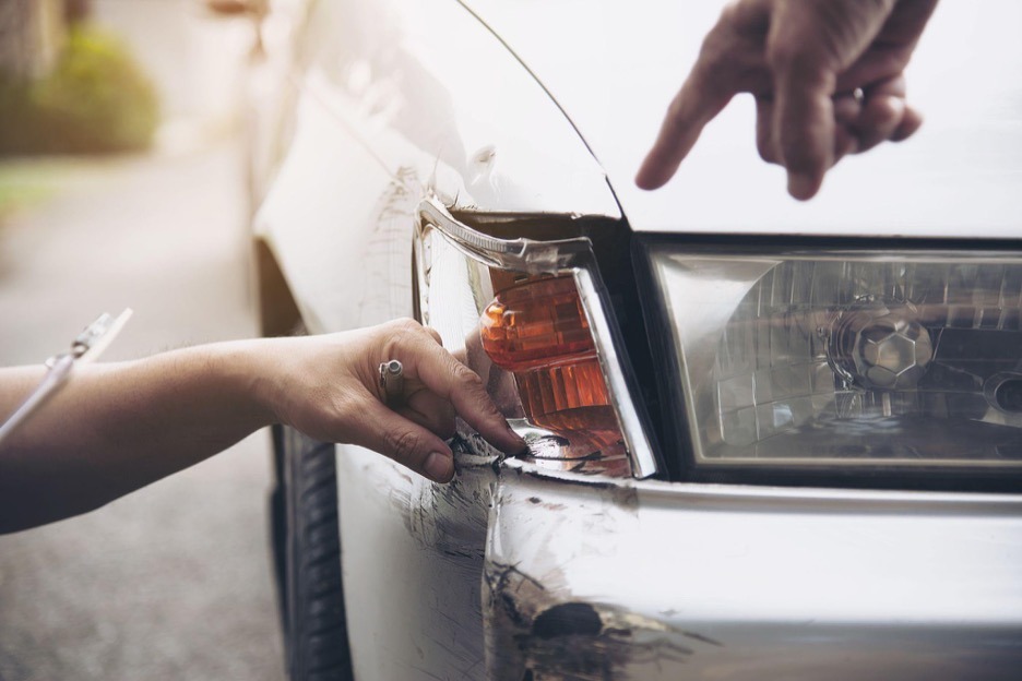 car with headlight damage